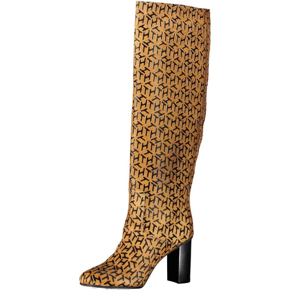 Tan knee-high heeled boot with black geometric pattern, luxury designer footwear
