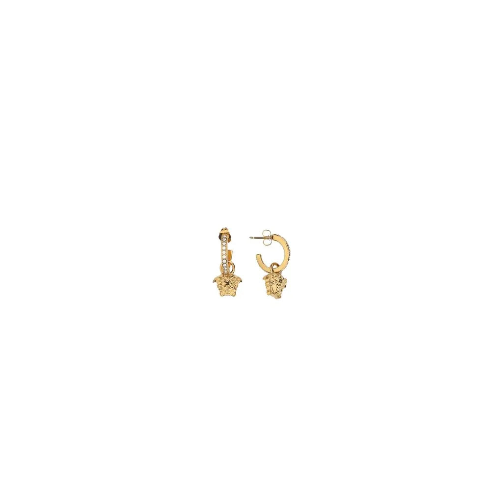 Gold Medusa hoop earrings with crystal accents on a white background