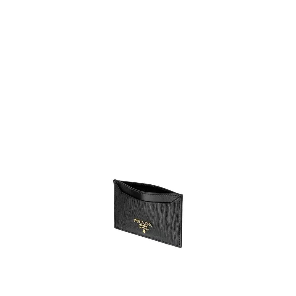 Black textured leather card holder with gold logo on white background