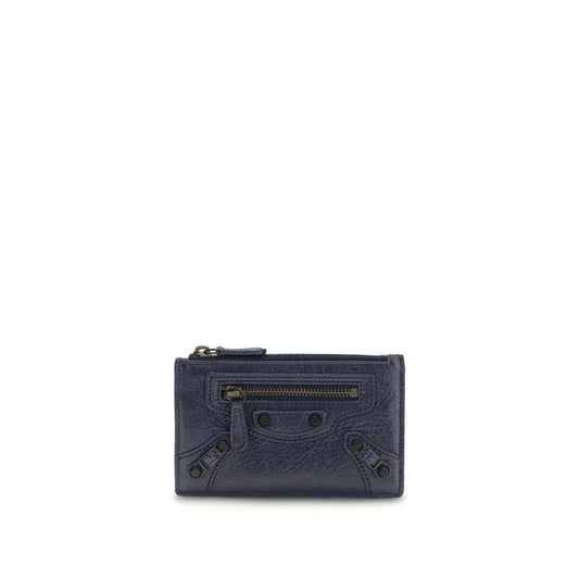 Navy blue leather zippered wallet with textured finish and decorative studs, front view