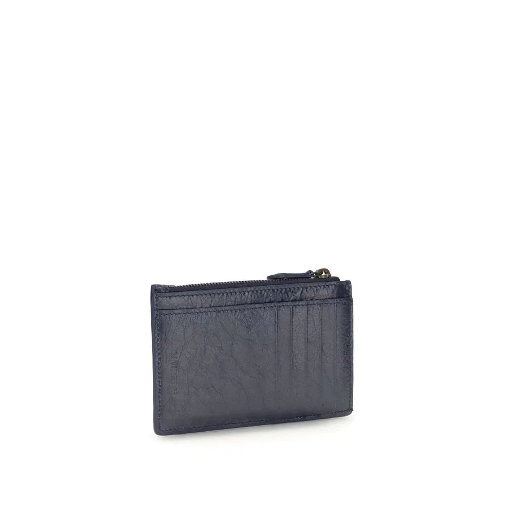 Navy blue leather card holder wallet with zippered coin pocket and card slots, isolated on white