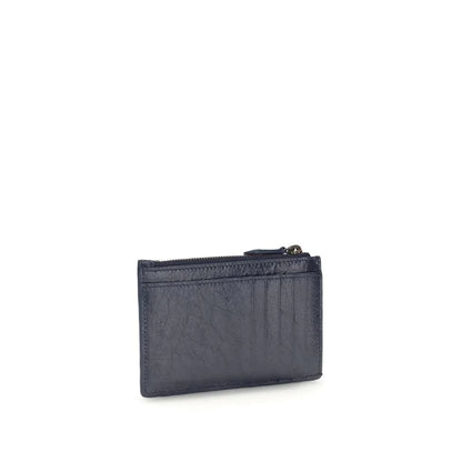 Navy blue leather card holder wallet with zippered coin pocket and card slots, isolated on white