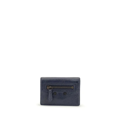 Navy blue leather card holder with front zipper pocket and textured finish on white background