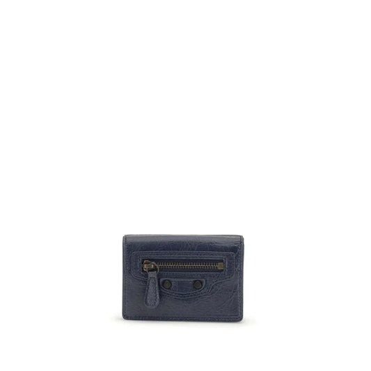 Navy blue leather card holder with front zipper pocket and textured finish on white background
