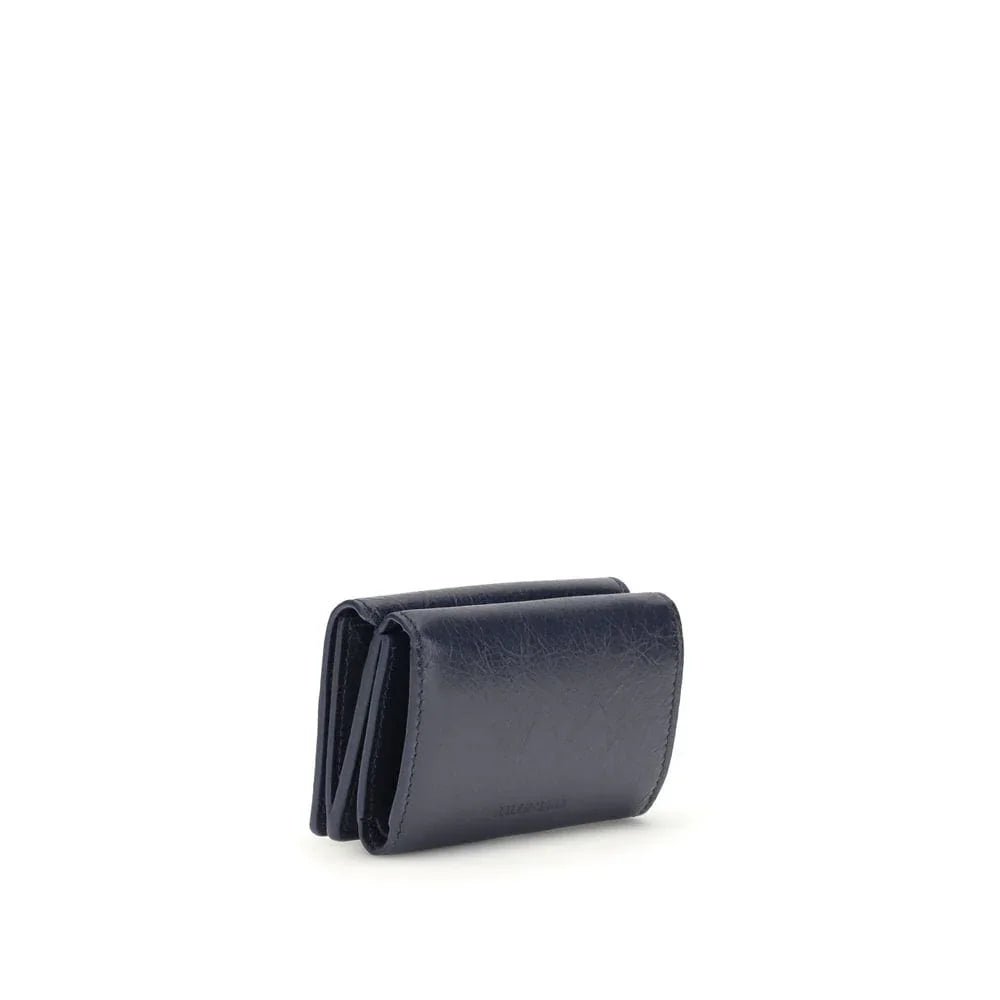 Black leather tri-fold wallet on white background, luxury accessory product photo