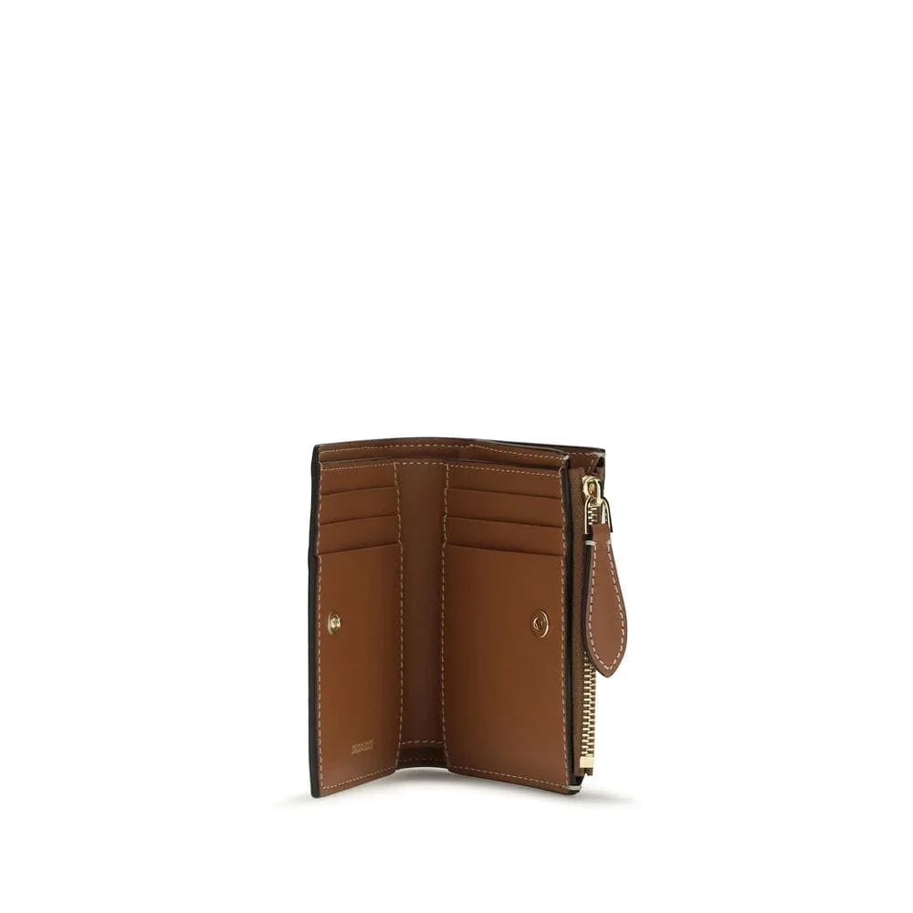 Brown leather wallet with card slots and zippered coin pocket, luxury accessory