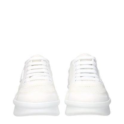 Front view of white mesh lace-up sneakers with rubber soles on a white background