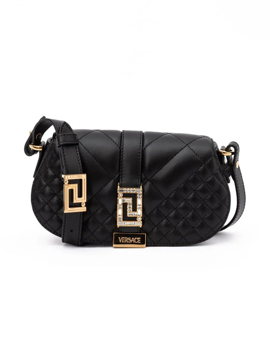 Quilted black leather designer bag with gold hardware and geometric buckle detail