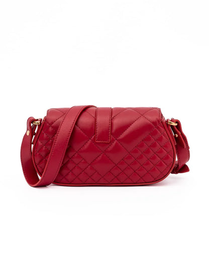 Red quilted leather crossbody bag with gold hardware on a white background
