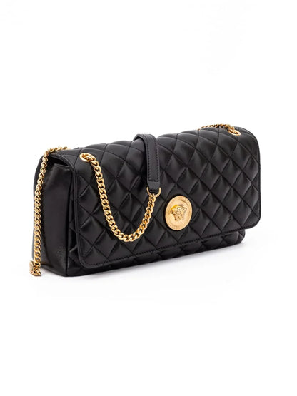 Black quilted leather shoulder bag with gold chain strap and medallion clasp on white background.