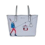 Designer tote bag with skier and gondola print, silver hardware, and monogram pattern