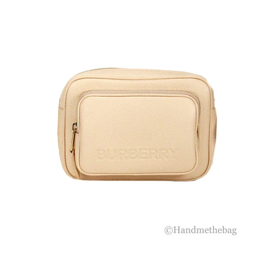 Beige leather designer crossbody bag with front zip pocket and embossed logo on white background.