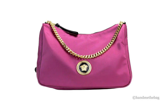 Purple designer shoulder bag with gold chain strap and medallion, luxury fashion accessory