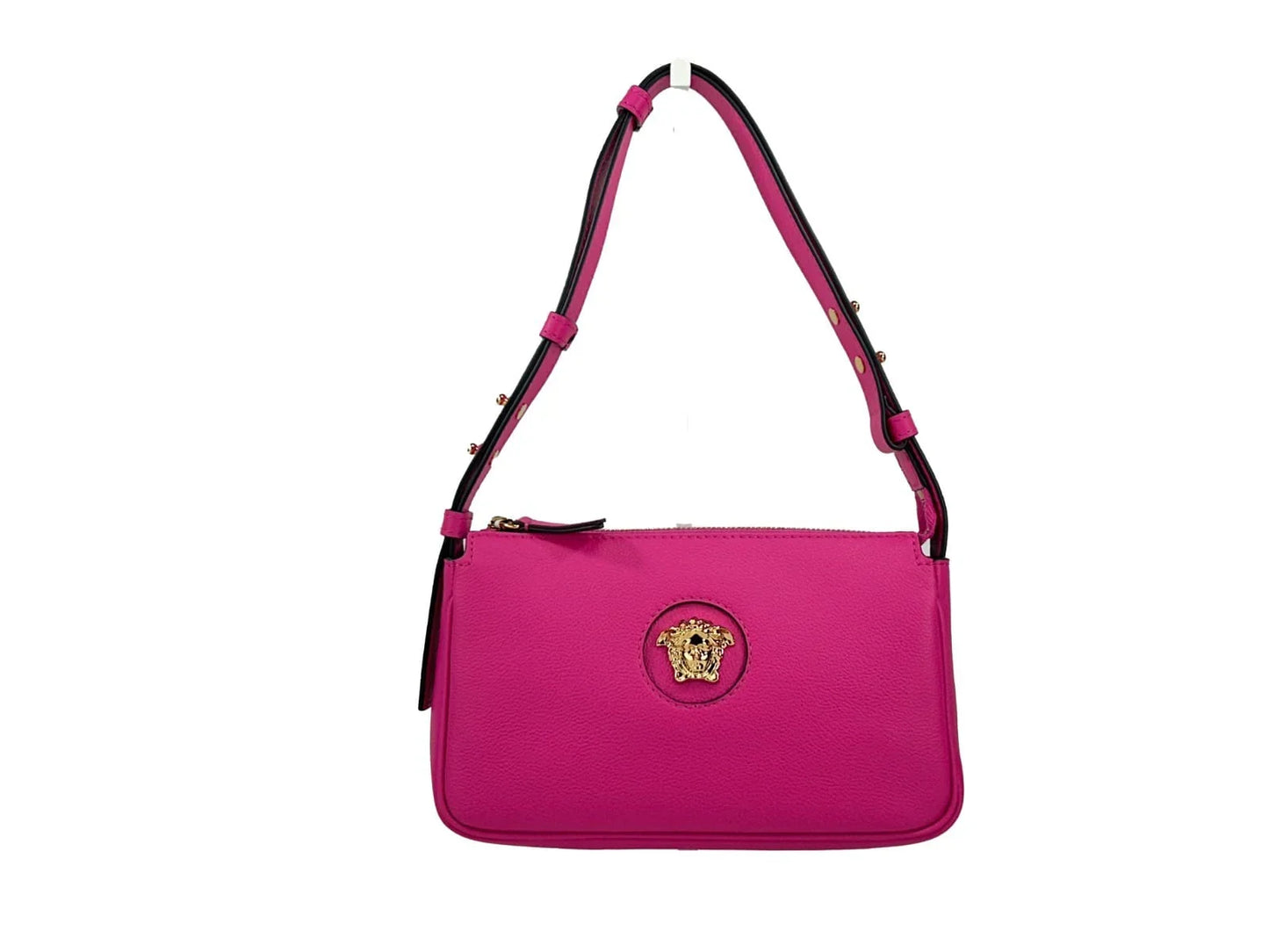 Pink leather designer shoulder bag with gold medallion detail and adjustable strap