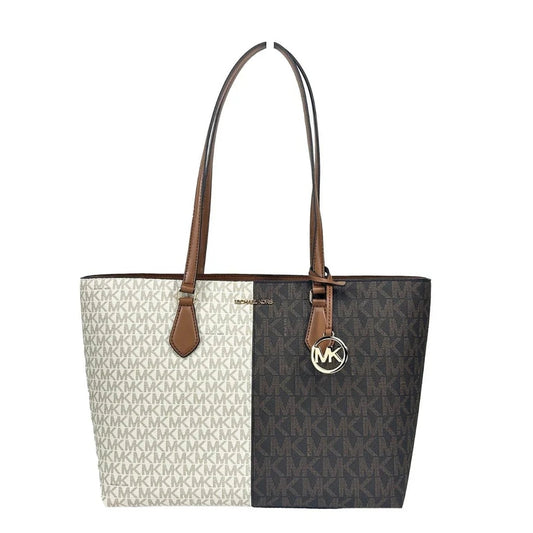 Two-tone logo tote bag with brown leather straps and gold charm on white background