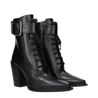 Black leather ankle boots with lace-up front, buckle strap, and block heel, luxury footwear