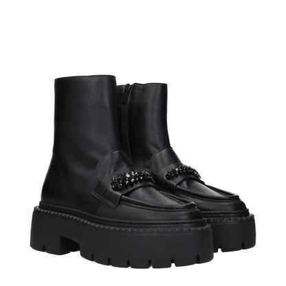 Chunky black leather ankle boots with crystal embellishments and platform soles