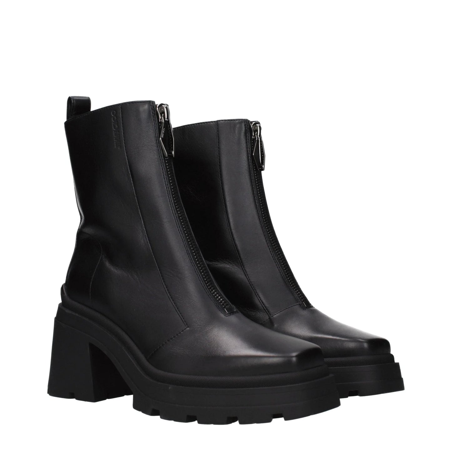Black chunky-heel leather ankle boots with front zipper and lug sole on white background