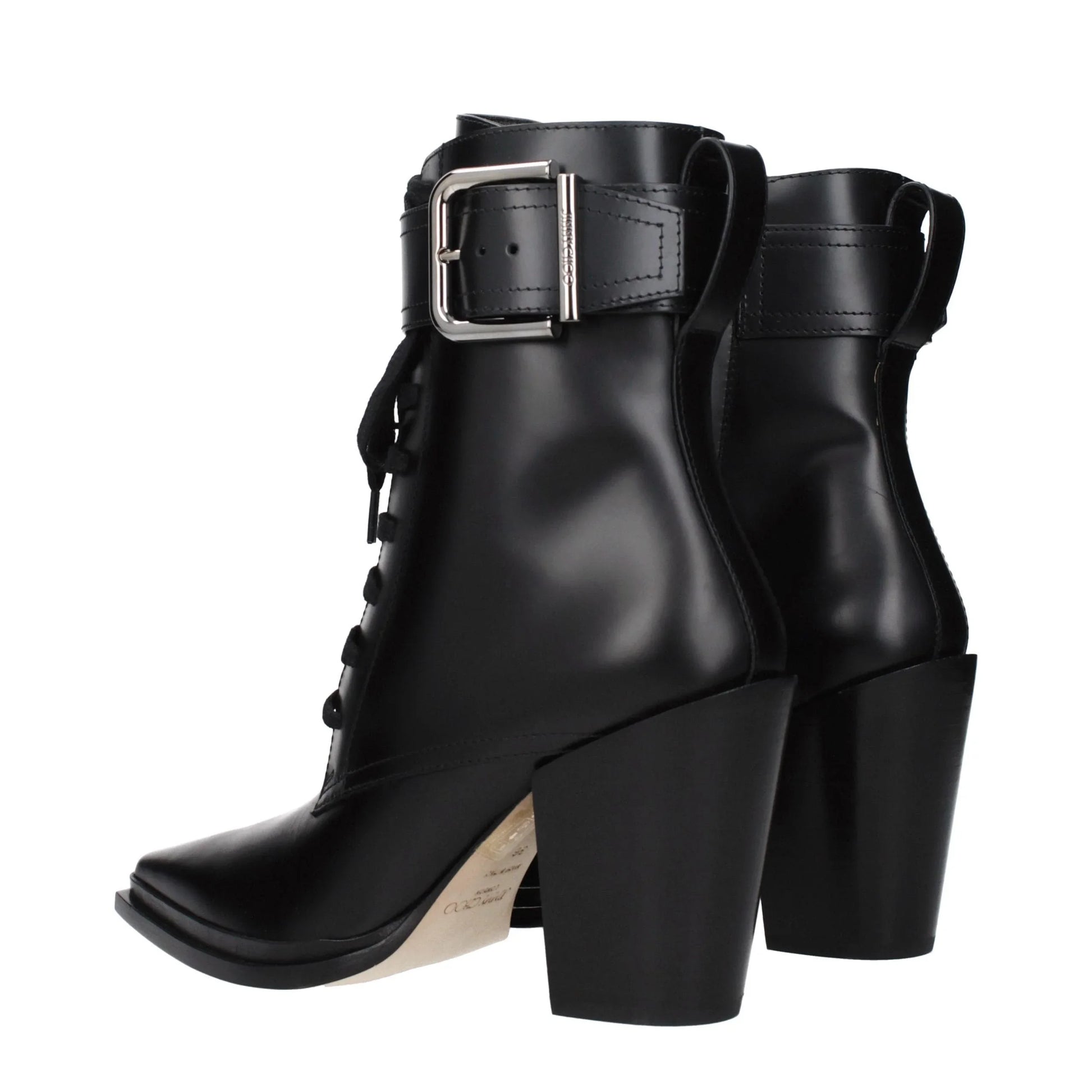 Black leather ankle boots with block heels, silver buckle strap, and lace-up design