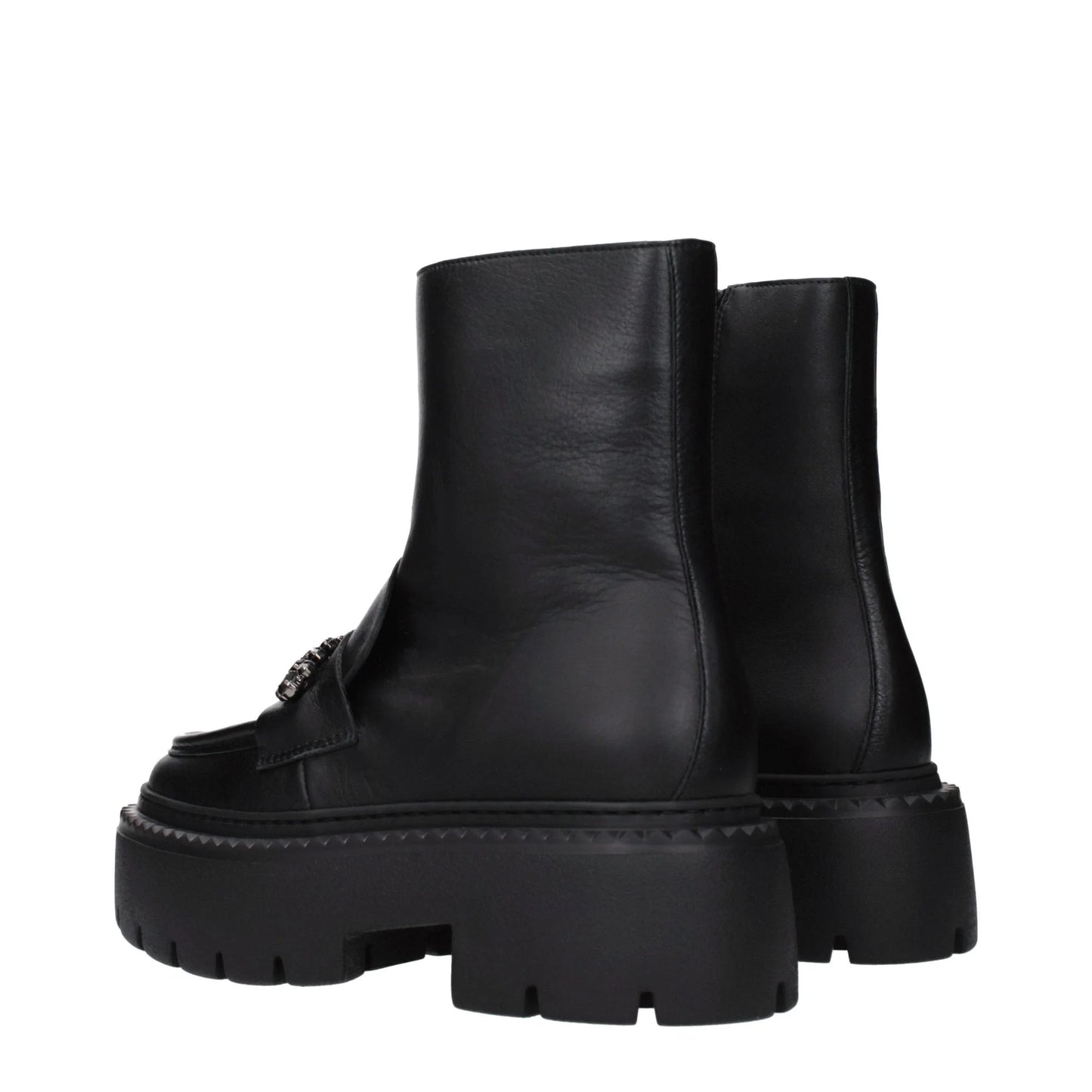 Black leather ankle boots with chunky lug sole and metal detail, side view