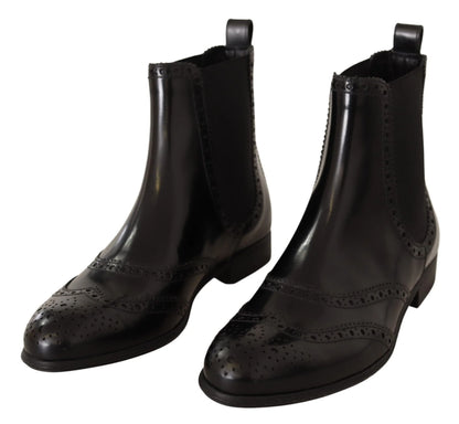 Black leather Chelsea boots with brogue detailing and elastic side panels