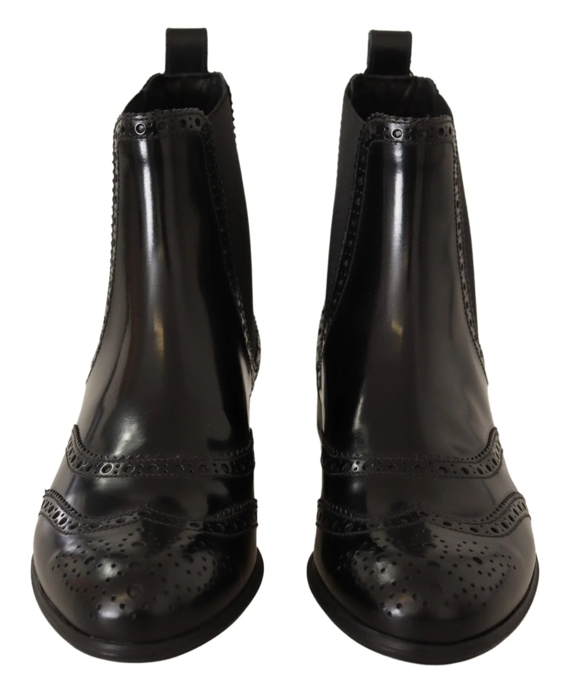 Front view of black leather brogue ankle boots with decorative perforated detailing