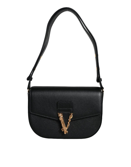 Black leather designer shoulder bag with gold chain detail and flap closure