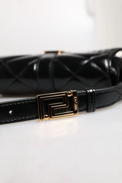 Black quilted designer handbag with gold geometric buckle and premium leather strap