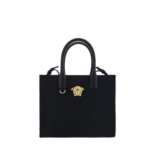 Black designer handbag with gold Medusa head accent and dual top handles