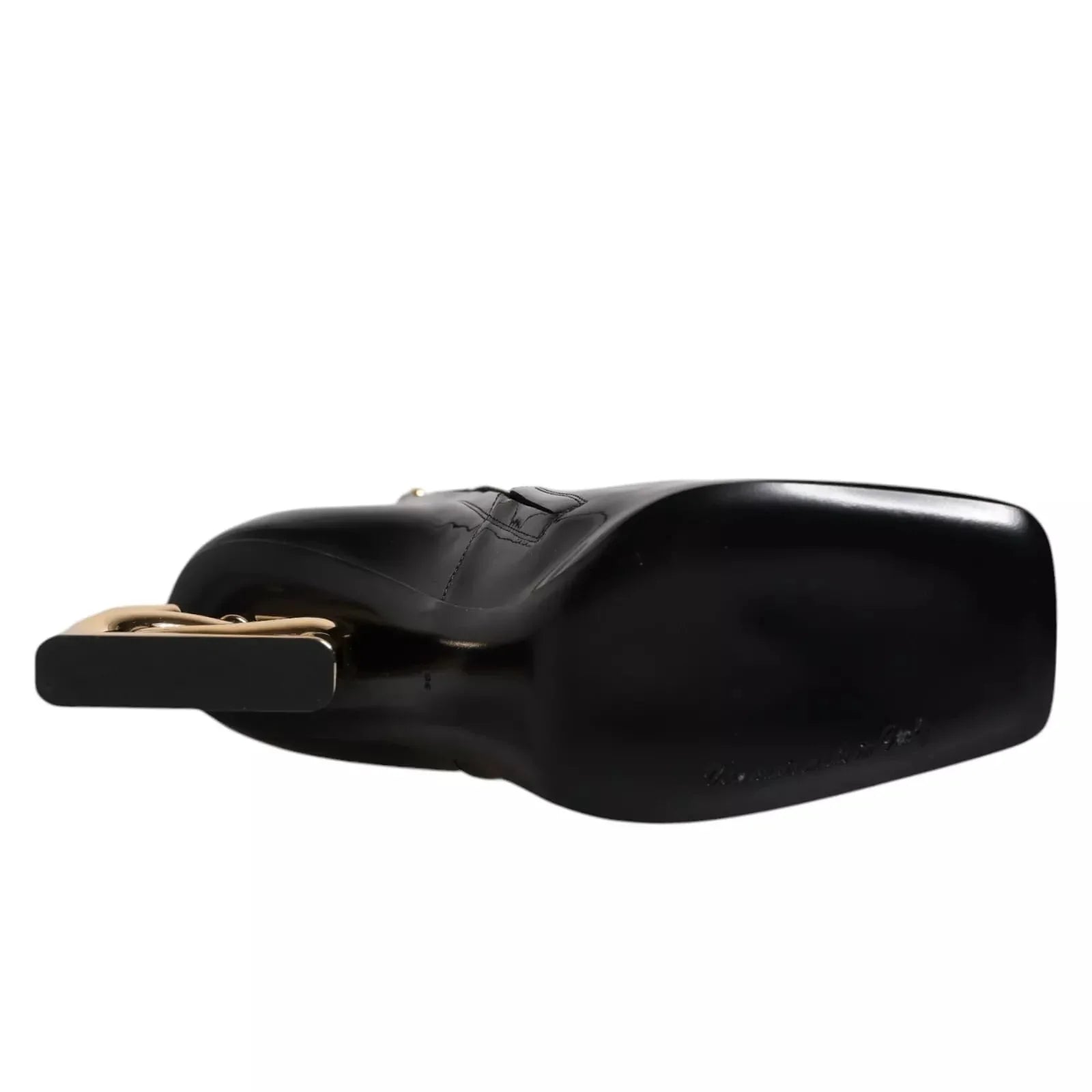 Close-up of a black leather designer handbag with gold-tone hardware on white background