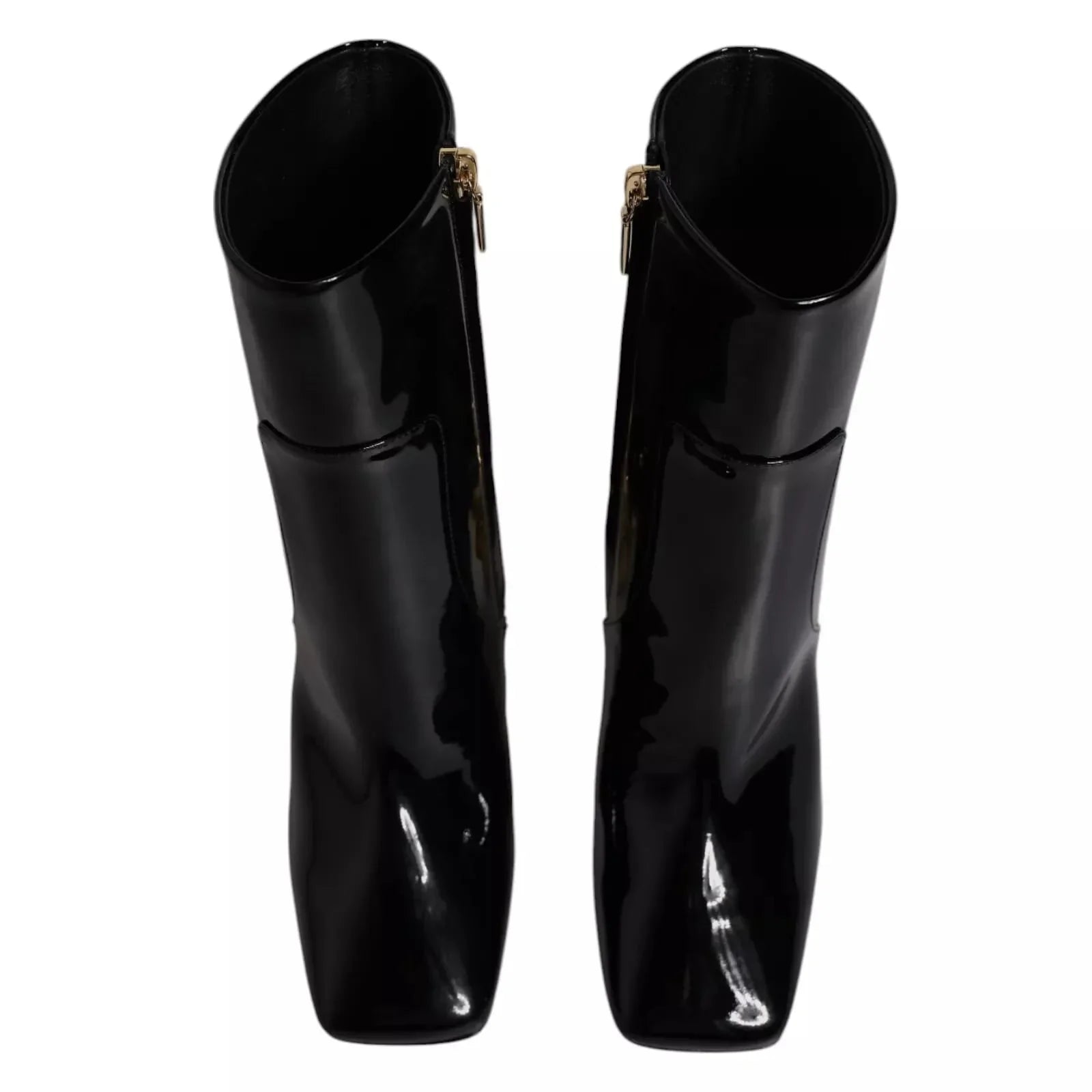 Pair of black patent leather square-toe boots with side zippers, luxury footwear