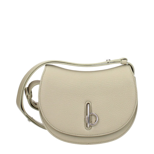 Beige leather crossbody bag with silver buckle and adjustable strap