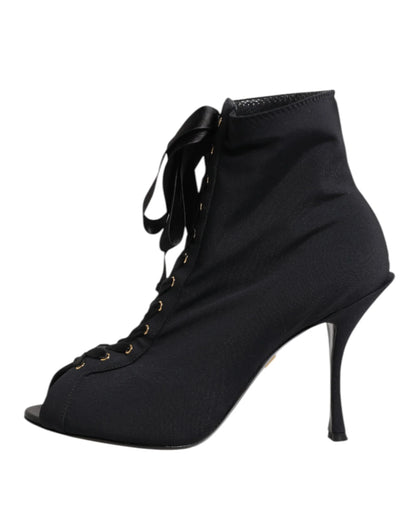 Black peep-toe lace-up stiletto ankle boot with ribbon detail, luxury footwear