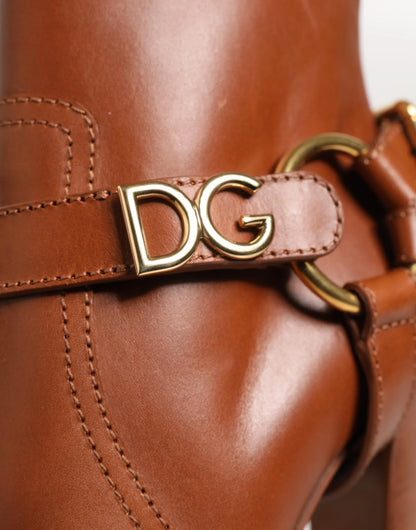 Brown leather designer boot with gold DG logo hardware and detailed stitching