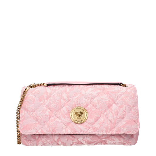 Pink quilted designer shoulder bag with gold chain strap and ornate gold medallion clasp