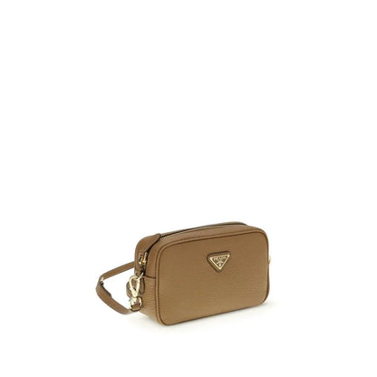 Taupe leather crossbody designer bag with gold hardware and zip closure on white background