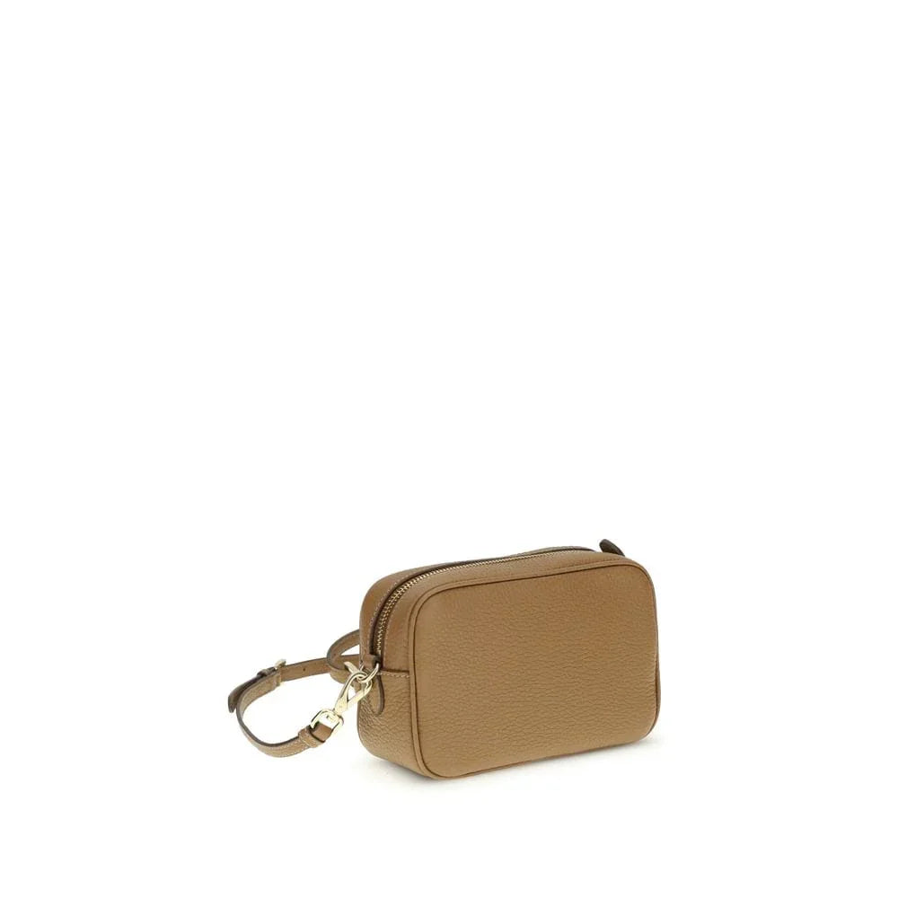 Brown leather crossbody bag with adjustable strap on white background
