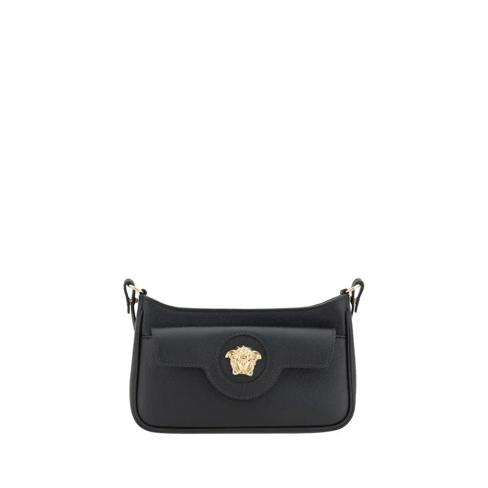 Black leather designer shoulder bag with gold Medusa emblem and detachable strap