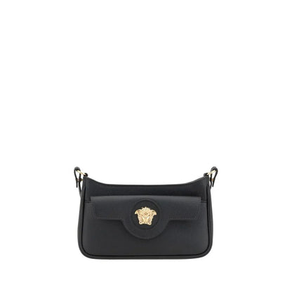 Black leather designer shoulder bag with gold Medusa emblem and detachable strap