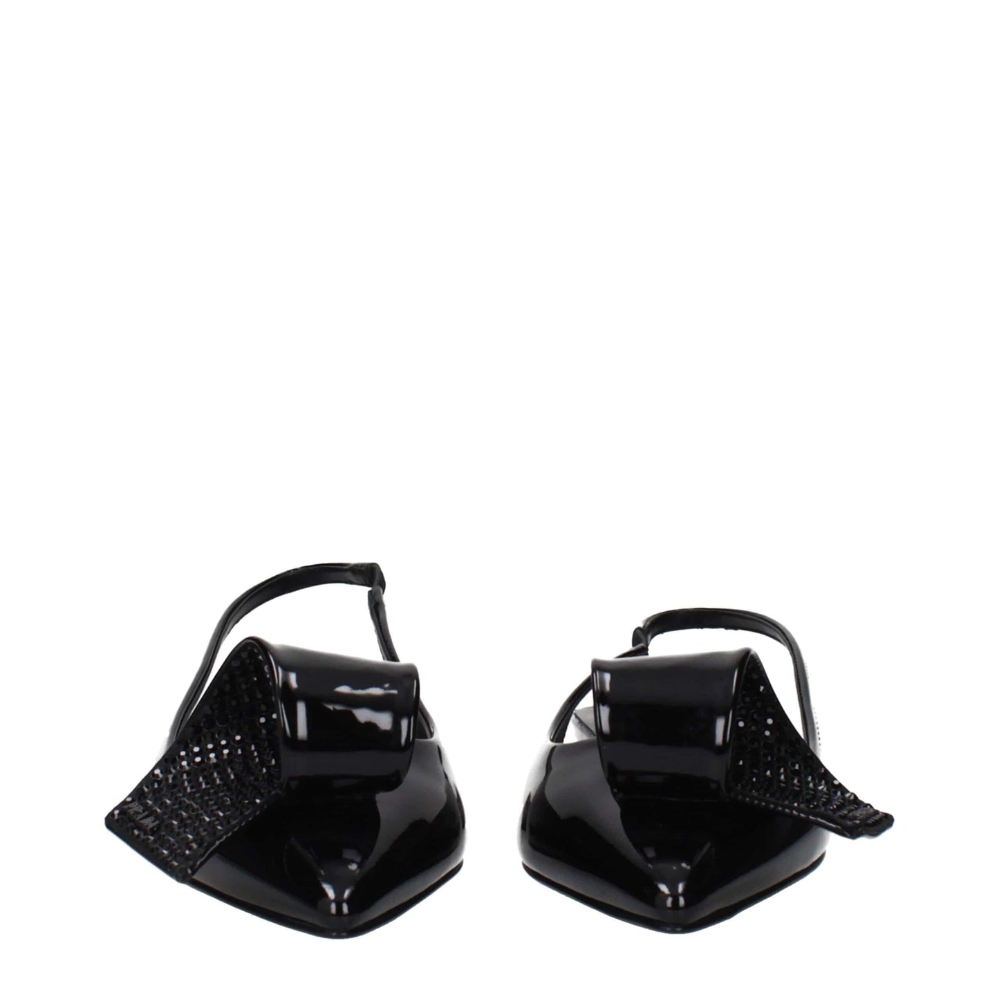 Black patent leather slingbacks with pointed toes and oversized decorative bows