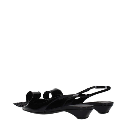 Black patent leather slingback kitten heel sandals with decorative bow detail