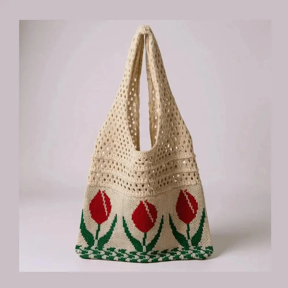 Beige crochet tote bag with red tulip flower pattern and open knit handles