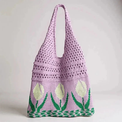 Lilac crochet tote bag with floral tulip pattern and green accents, boho beach style