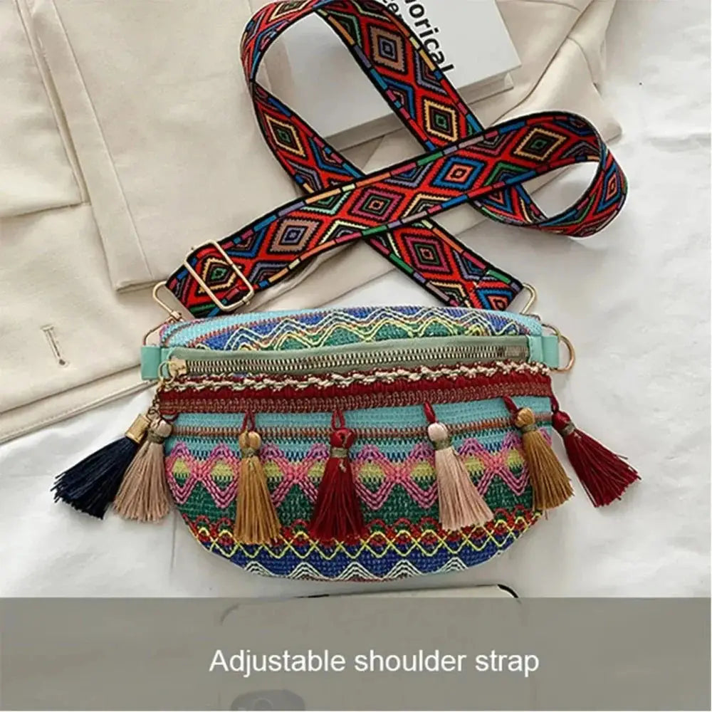 Colorful woven crossbody bag with tassels, zipper closure, and adjustable patterned strap