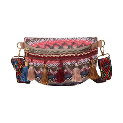 Colorful woven crossbody bag with zipper, tassels, and patterned adjustable strap