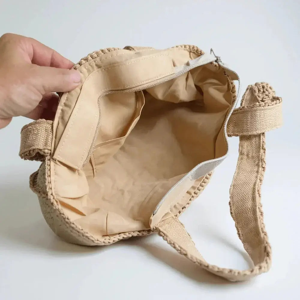 Handmade crochet tote bag in beige cotton yarn with spacious zippered interior