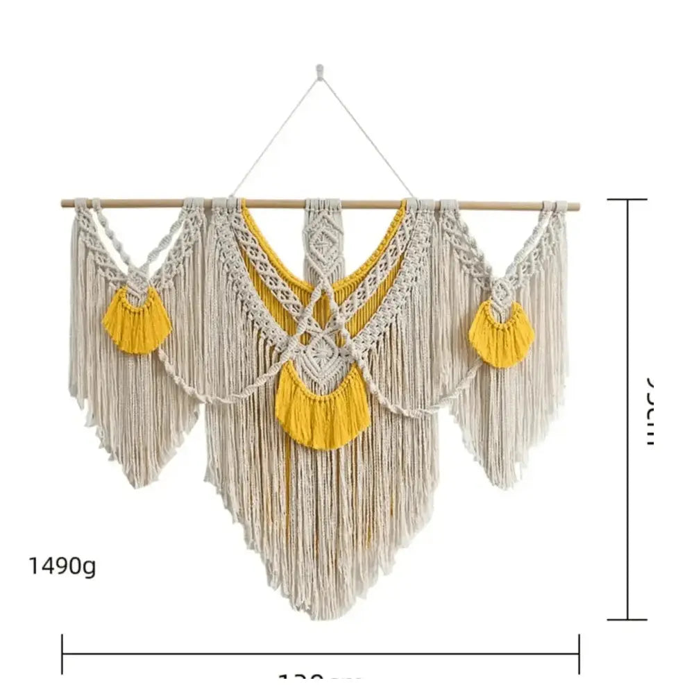 Large boho macrame wall hanging in natural cotton rope with yellow accents, decorative fringe.